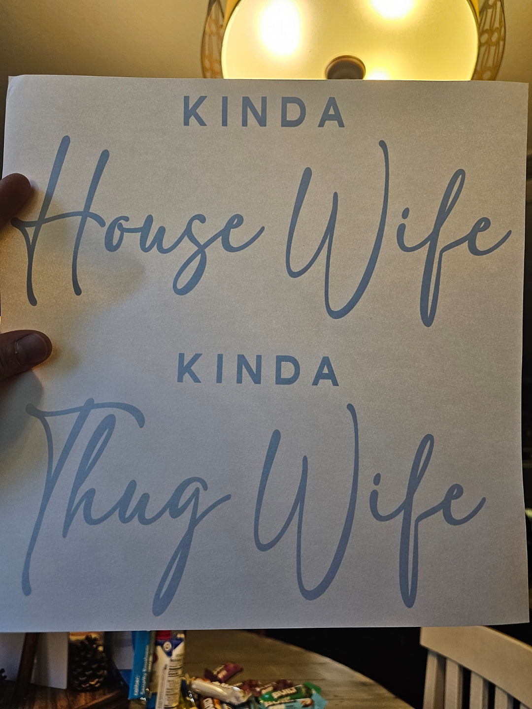 Kinda house wife. Kinda thug wife