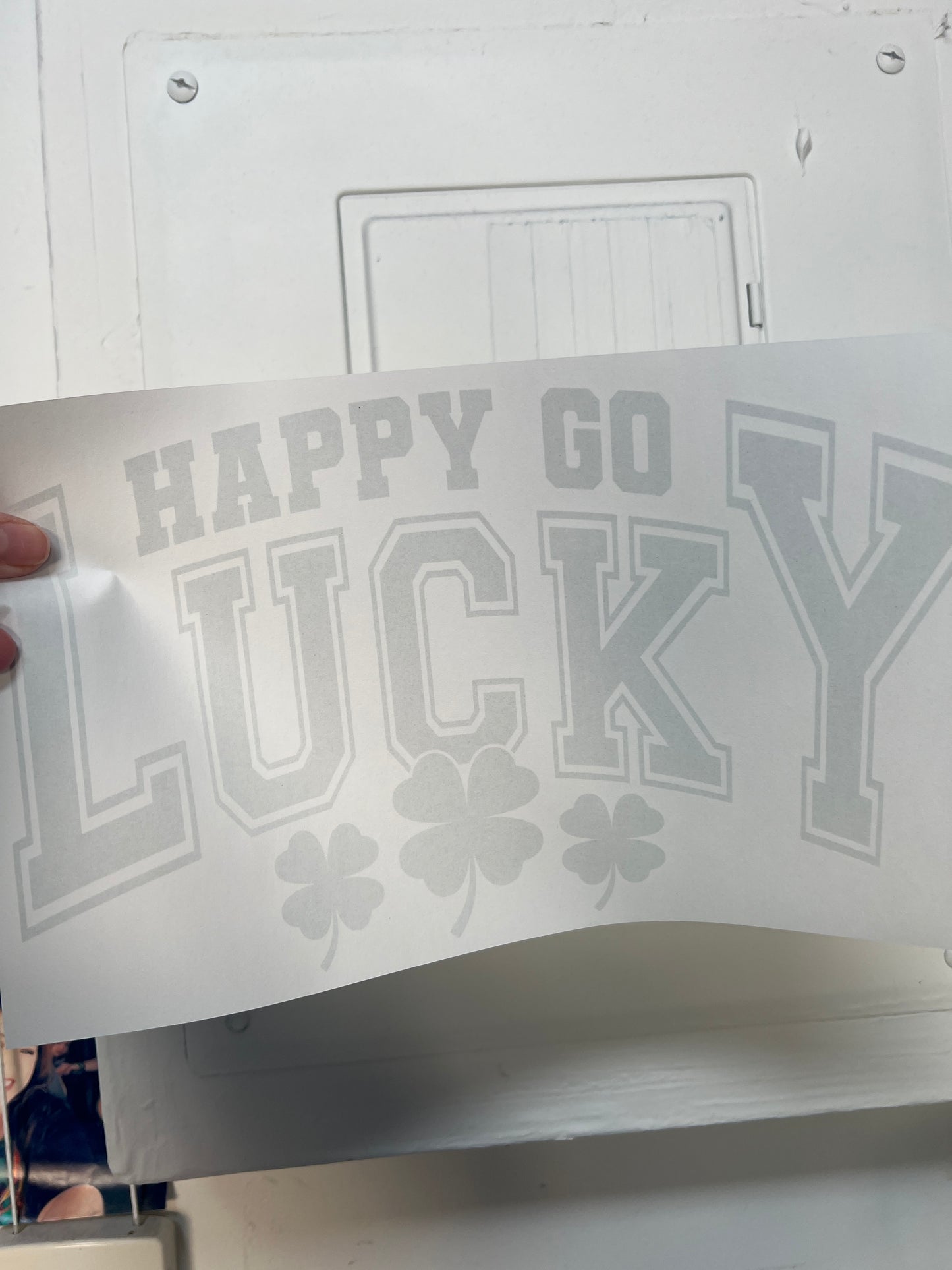 Happy go lucky (green writing)