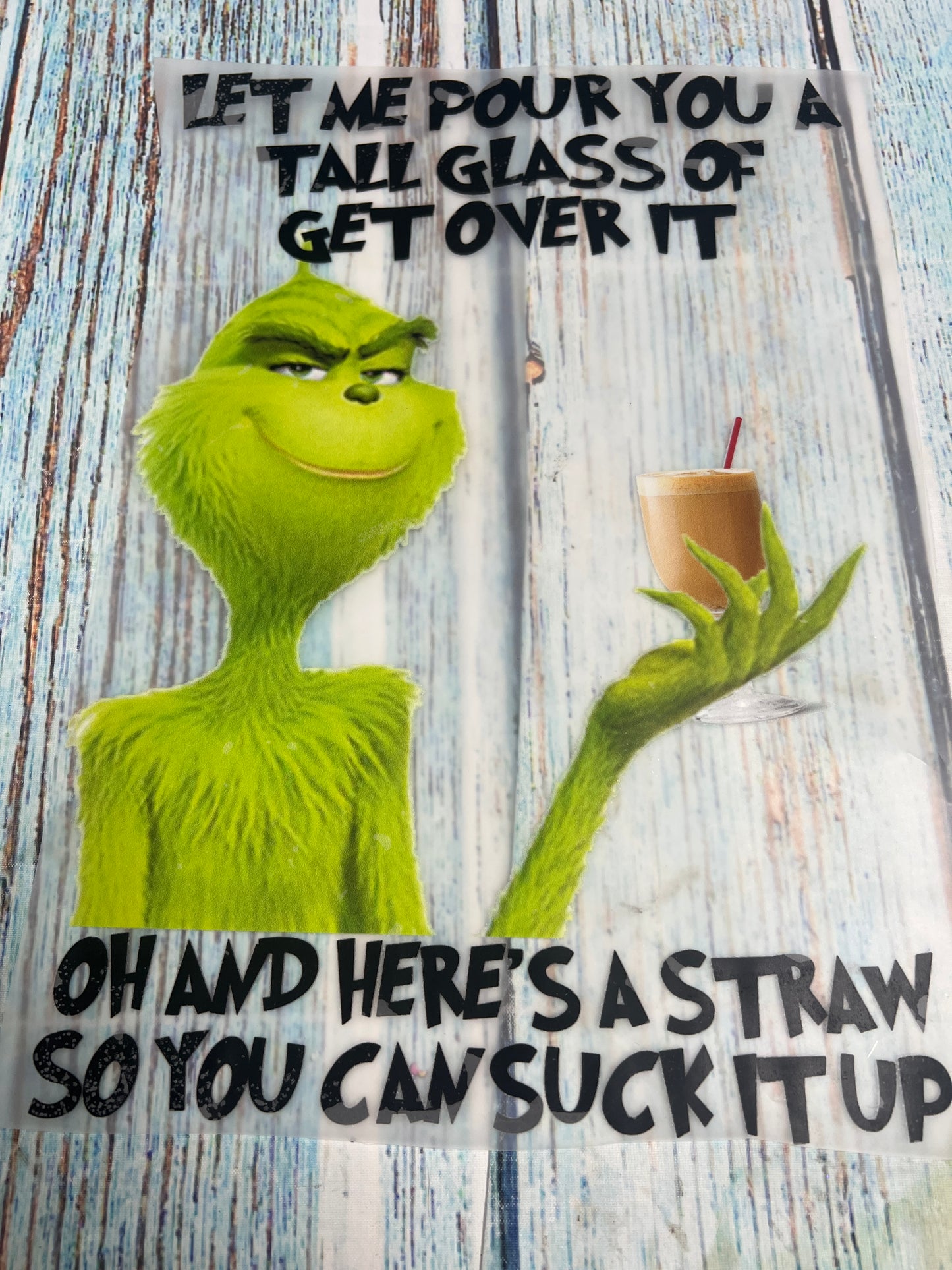 Tall glass of get over it green man