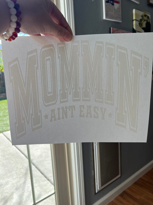Mommin ain’t easy (white)