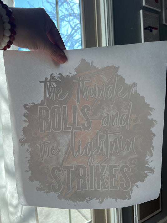 The thunder rolls and the lightning strikes