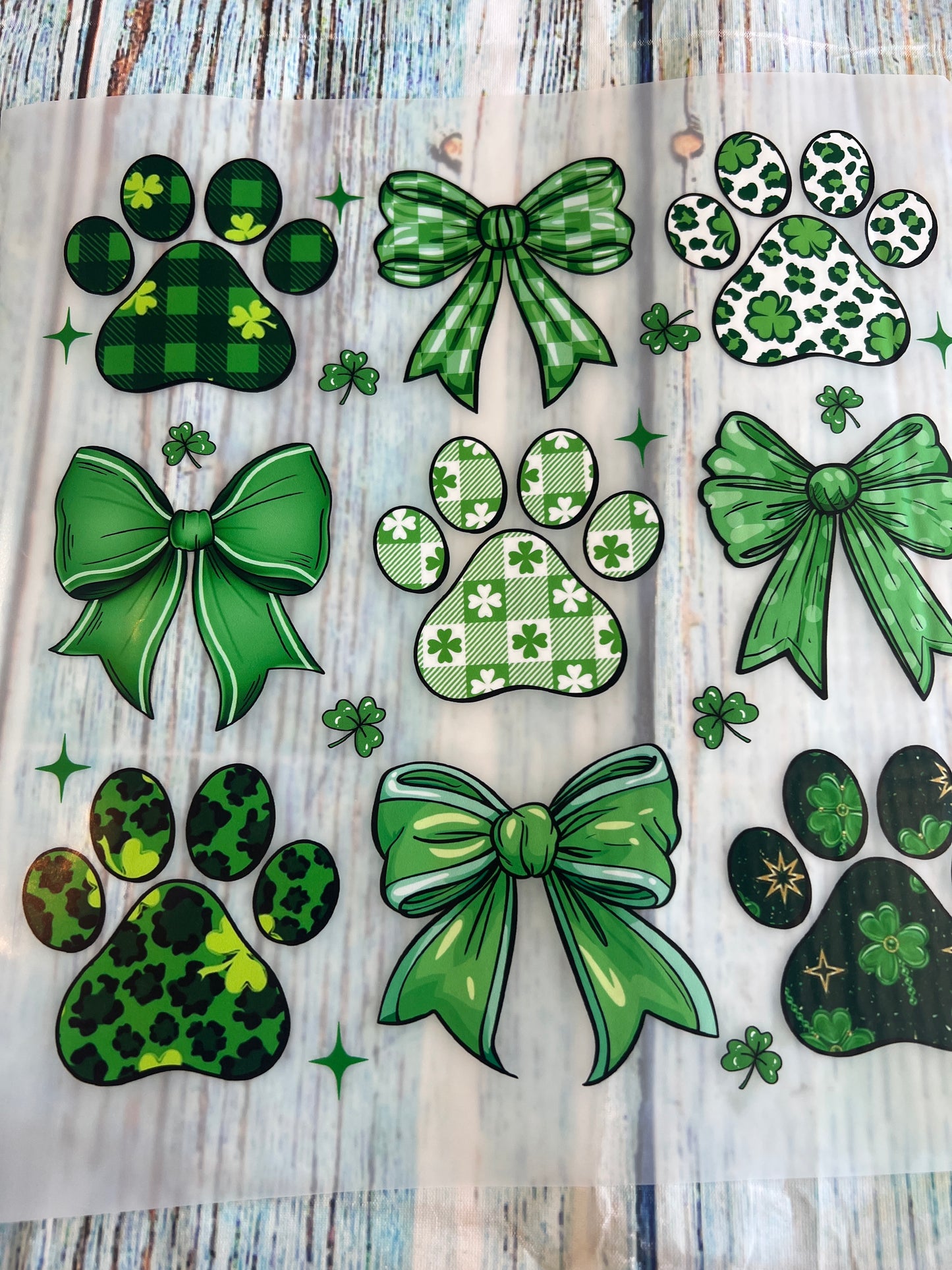 Green paws and bows